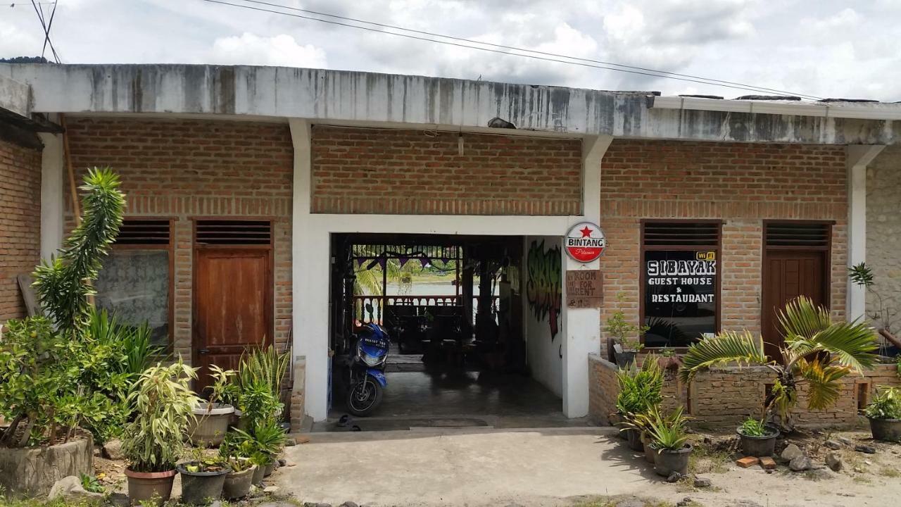 Sibayak Guesthouse ตุกตุก ภายนอก รูปภาพ