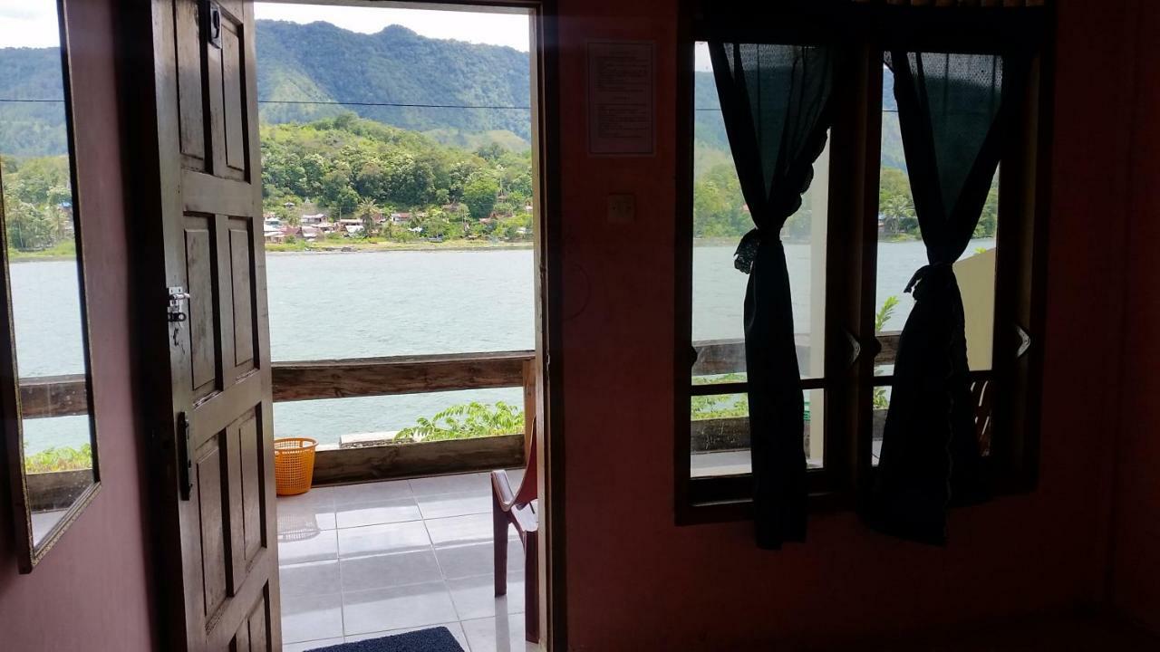 Sibayak Guesthouse ตุกตุก ภายนอก รูปภาพ