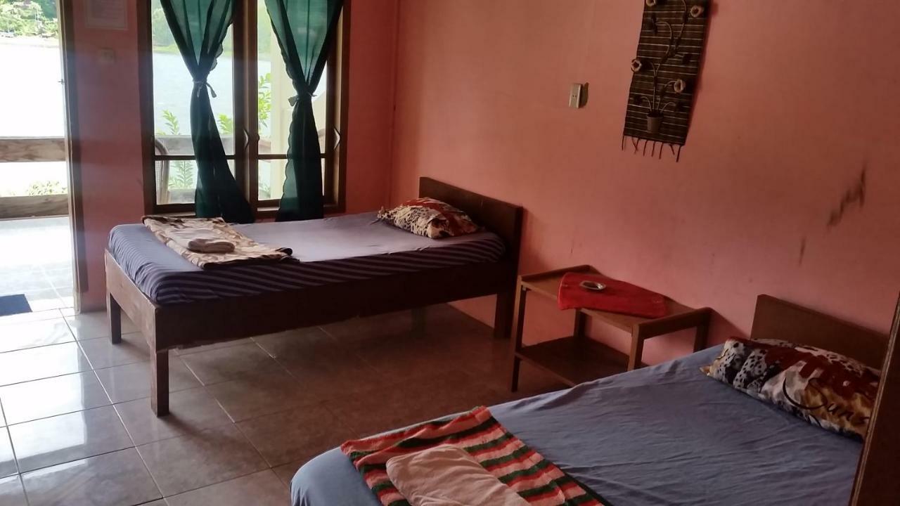 Sibayak Guesthouse ตุกตุก ภายนอก รูปภาพ